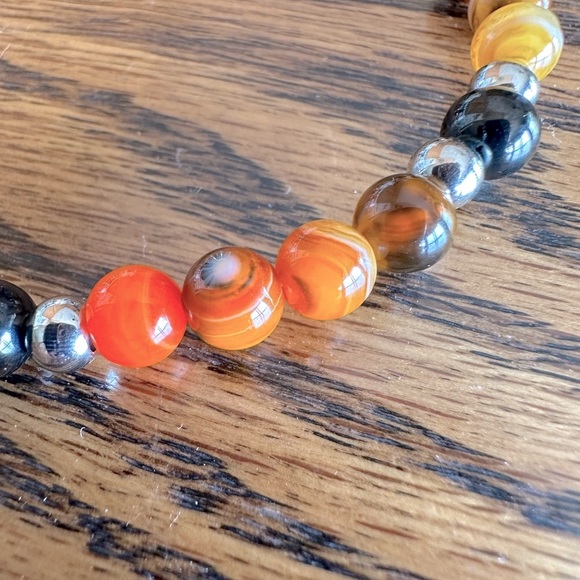 Handcrafted bracelet made with bumblebee agate and sterling silver charms. - Picture 3 of 4